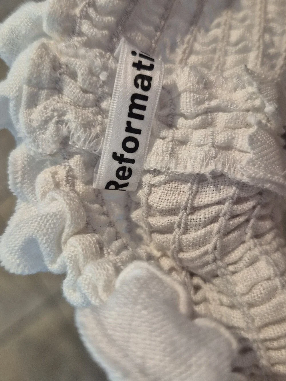 Reformation feminine square